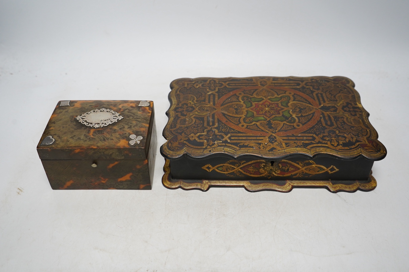 A Victorian silver mounted tortoiseshell playing card box and a similar papier mache box. Condition - poor to fair